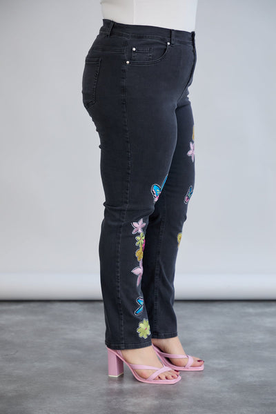 Schwarze Jeans mit bunter Stickerei & Glitzersteinen – Große Größen