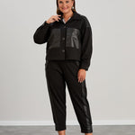 Kurze Strickjacke mit Lederdetails – Schwarz
