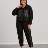 Kurze Strickjacke mit Lederdetails – Schwarz