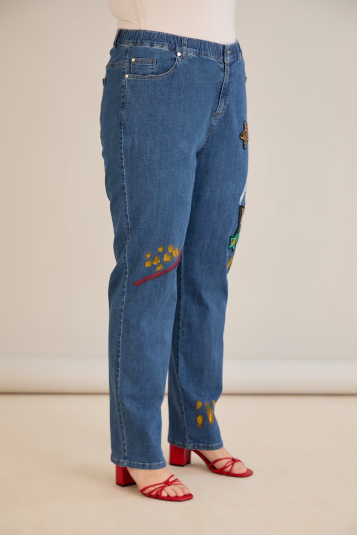 Jeans mit Applikationen und elastischem Bund
